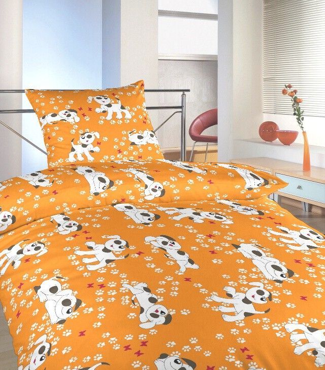 Z kvalitného materiálu detské krepové posteľné obliečky do postieľky Psíkovia oranžoví, Dadka